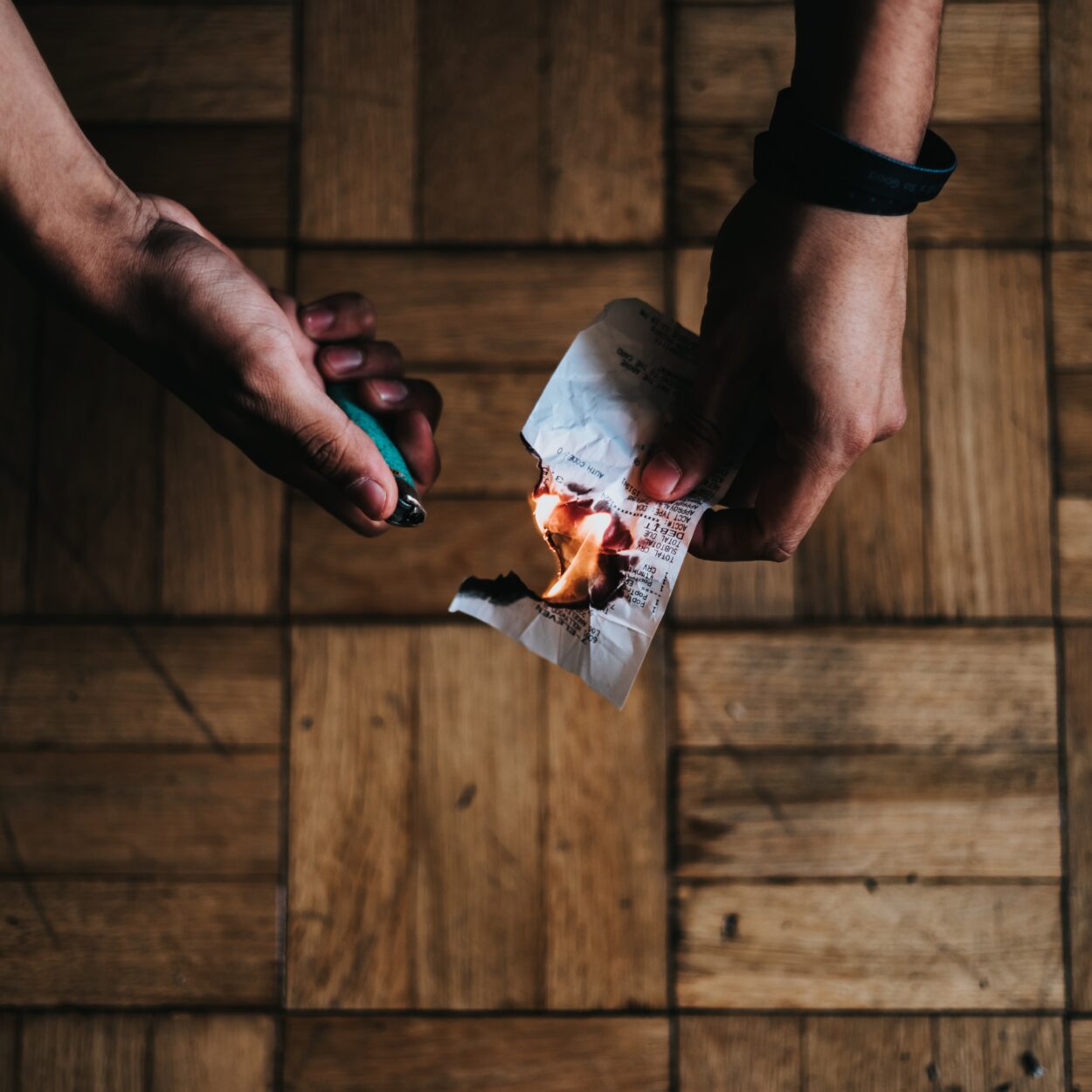 person burning paper