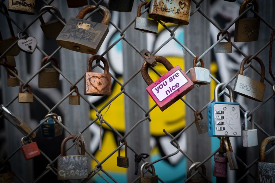 a group of locks on a fence